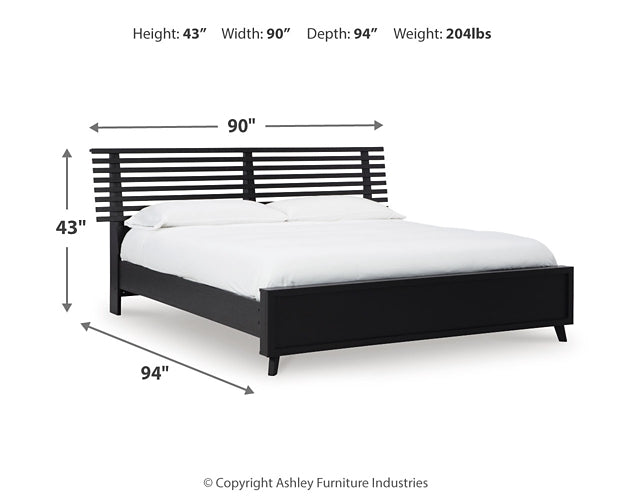 Danziar King Panel Bed with Mirrored Dresser