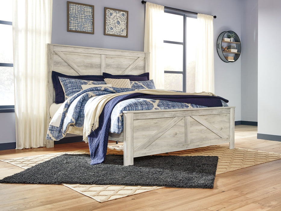 Bellaby Queen Crossbuck Panel Bed with Mirrored Dresser Tuscaloosa Furniture Outlet