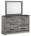 Bronyan Queen Panel Bed with Mirrored Dresser Tuscaloosa Furniture Outlet