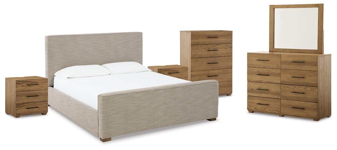 Dakmore King Upholstered Bed with Mirrored Dresser, Chest and 2 Nightstands Tuscaloosa Furniture Outlet