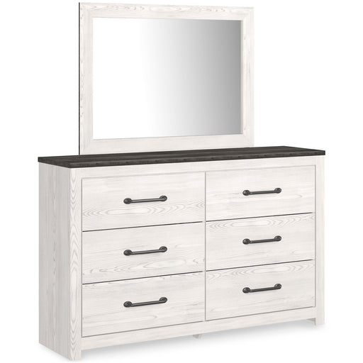 Gerridan Full Panel Bed with Mirrored Dresser and Chest Tuscaloosa Furniture Outlet