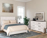 Gerridan Queen Panel Bed with Mirrored Dresser and Nightstand Tuscaloosa Furniture Outlet