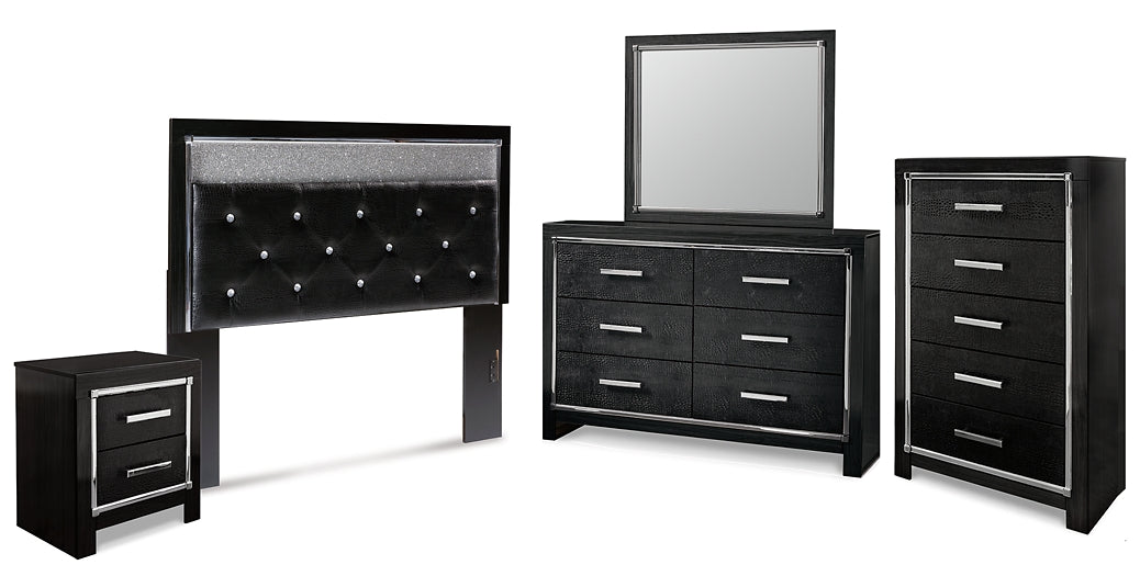 Kaydell Queen Upholstered Panel Headboard with Mirrored Dresser, Chest and Nightstand Tuscaloosa Furniture Outlet