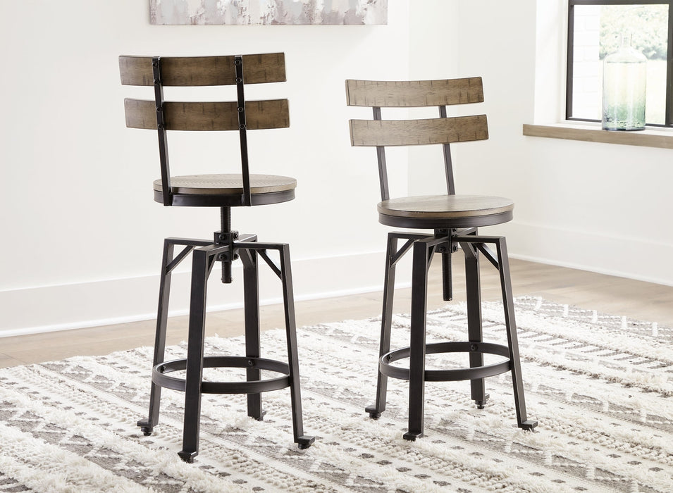 Lesterton Swivel Barstool (2/CN) Tuscaloosa Furniture Outlet