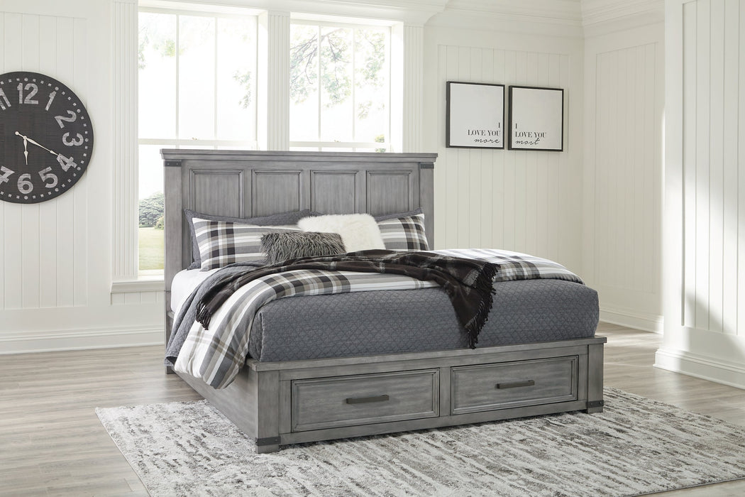 Russelyn King Storage Bed with Mirrored Dresser and Chest Tuscaloosa Furniture Outlet