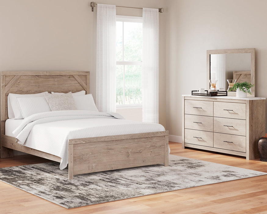 Senniberg Queen Panel Bed with Mirrored Dresser Tuscaloosa Furniture Outlet