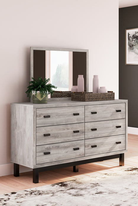 Vessalli King Panel Bed with Mirrored Dresser